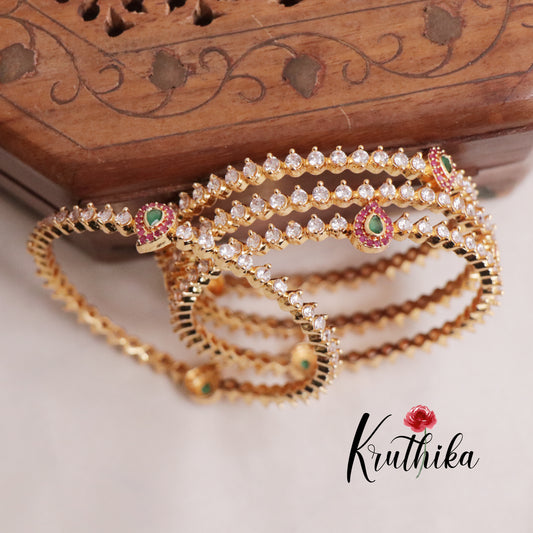 Trendy Gold Finish Multi Stone Bangles B205 (set of 4)