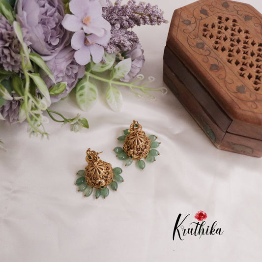 Beautiful AD Peacock Jhumka with Pastel Green Beads E659