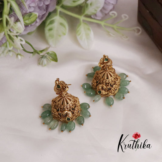 Beautiful AD Peacock Jhumka with Pastel Green Beads E659