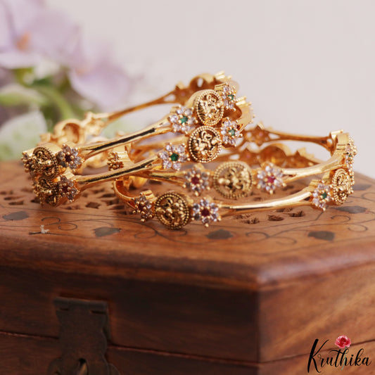 Trendy Antique Floral Lakshmi Motifs Gold-Tone CZ Bangles B580 (Set of 4 Bangles)
