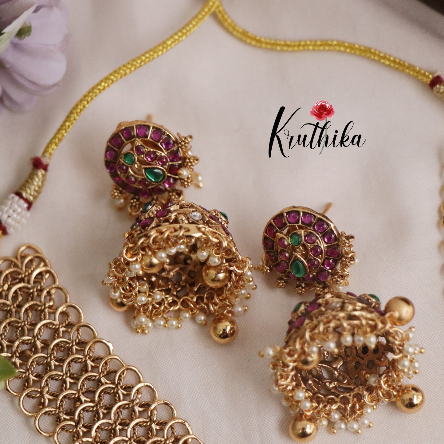 Classic Jadau Peacock Pendant Necklace with Golden Loop Chain Design and Jhumkas NC2178