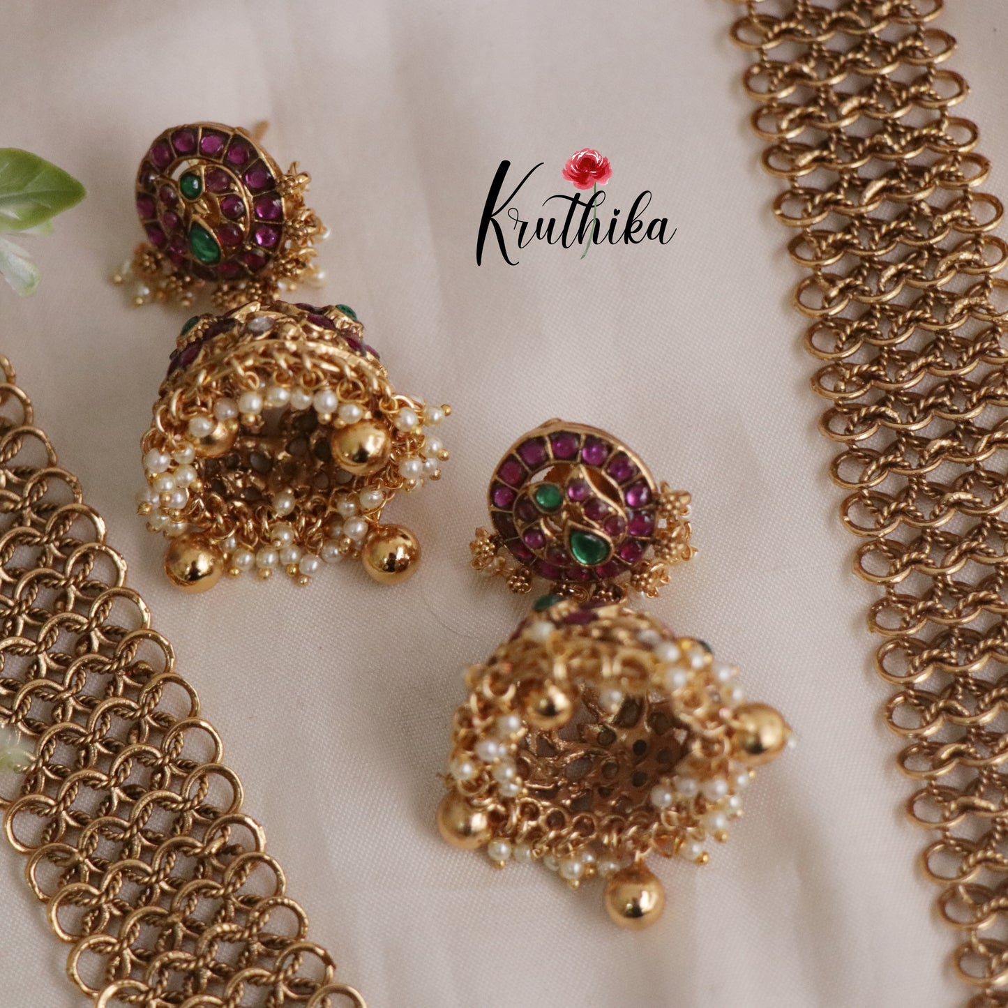 Classic Jadau Peacock Pendant Necklace with Golden Loop Chain Design and Jhumkas LH1935