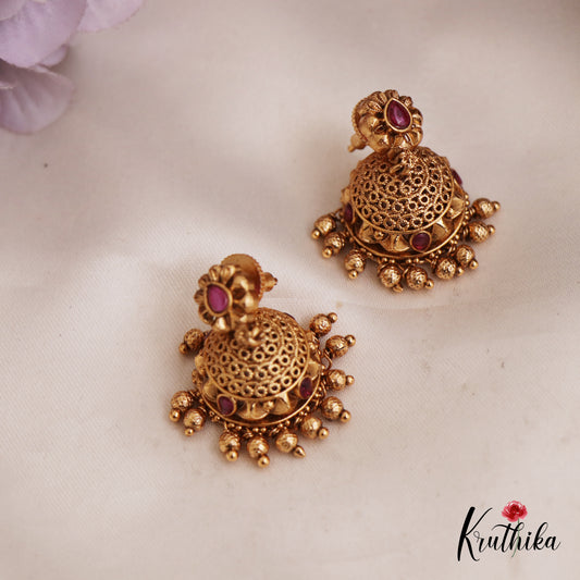 Beautiful Antique Floral Motifs Jhumka With Golden Bead Drops E967 (Available In 2 Colors)