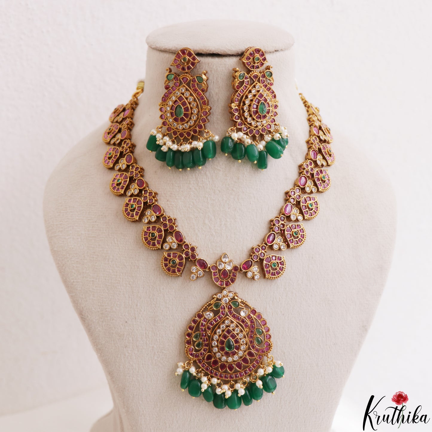 Premium Peacock Floral Motifs Kemp Haaram With Green Bead Drops NC3186