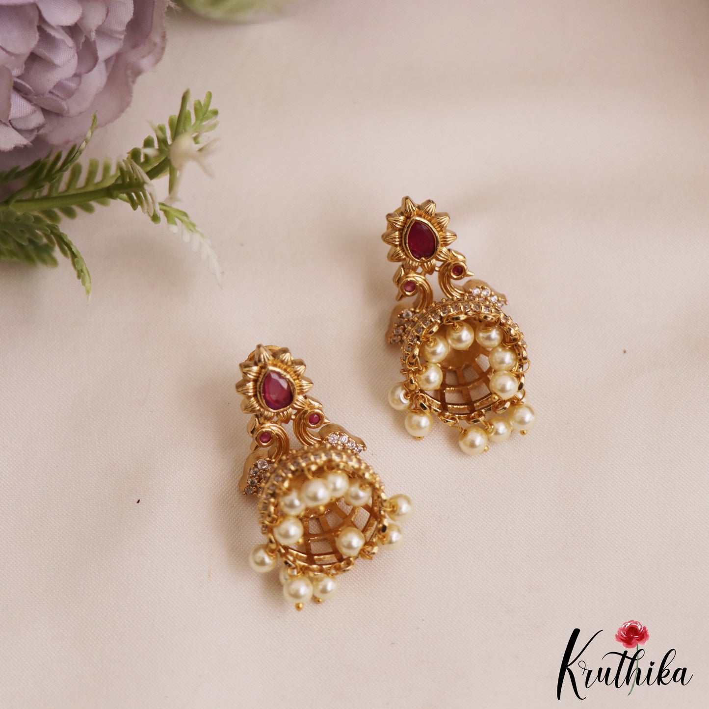 Beautiful Peacock Motifs Gold-Tone Jhumka With Pearl Drops E1053