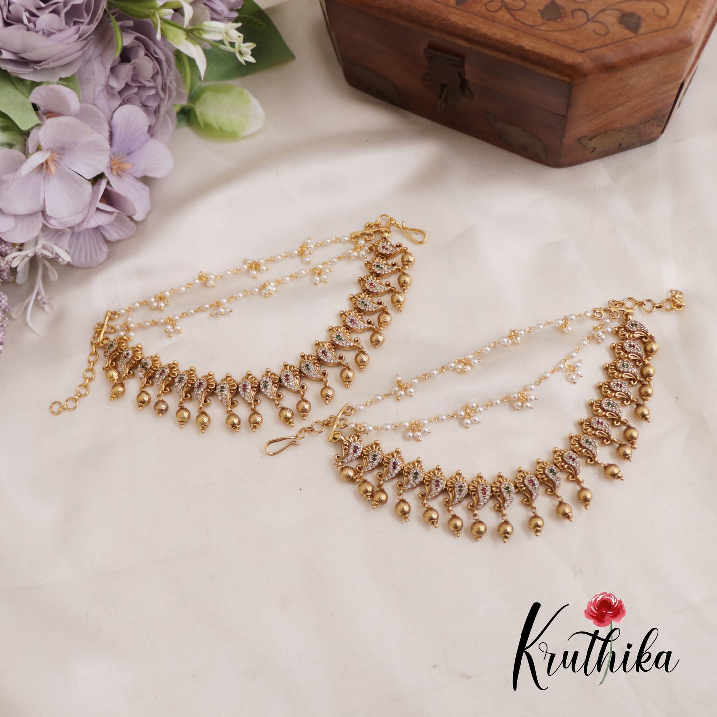 Elegant CZ Mango Motifs Multiple Strand Earchains With Golden Bead Drops EC189