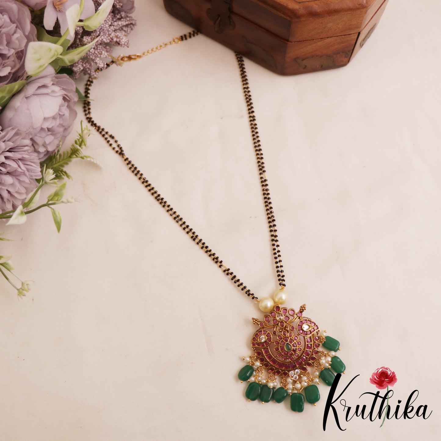 Classic Floral Mango Motifs Double Layered Mangalsutra With Green Bead Drops NC2905