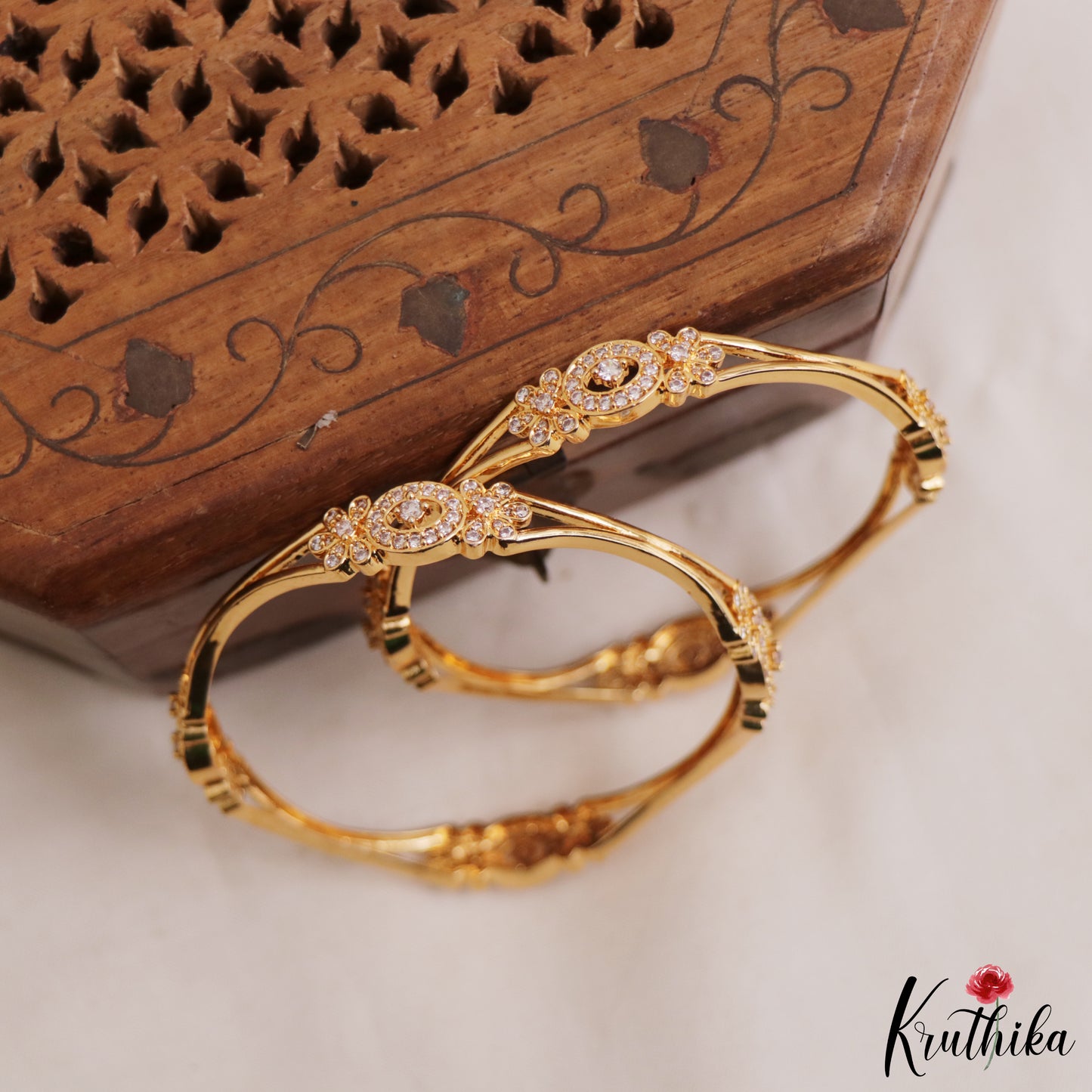 Pretty Floral Motifs Diamond-Finish Gold-Tone AD Bangles B533 (Set of 2)