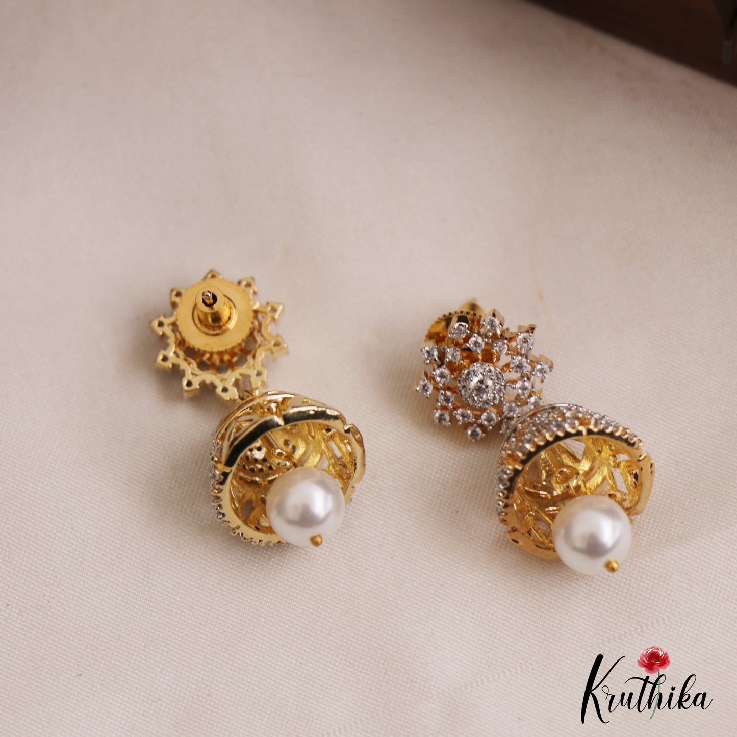 Trendy Floral Motifs CZ Jhumkas With Pearl Drop E1120