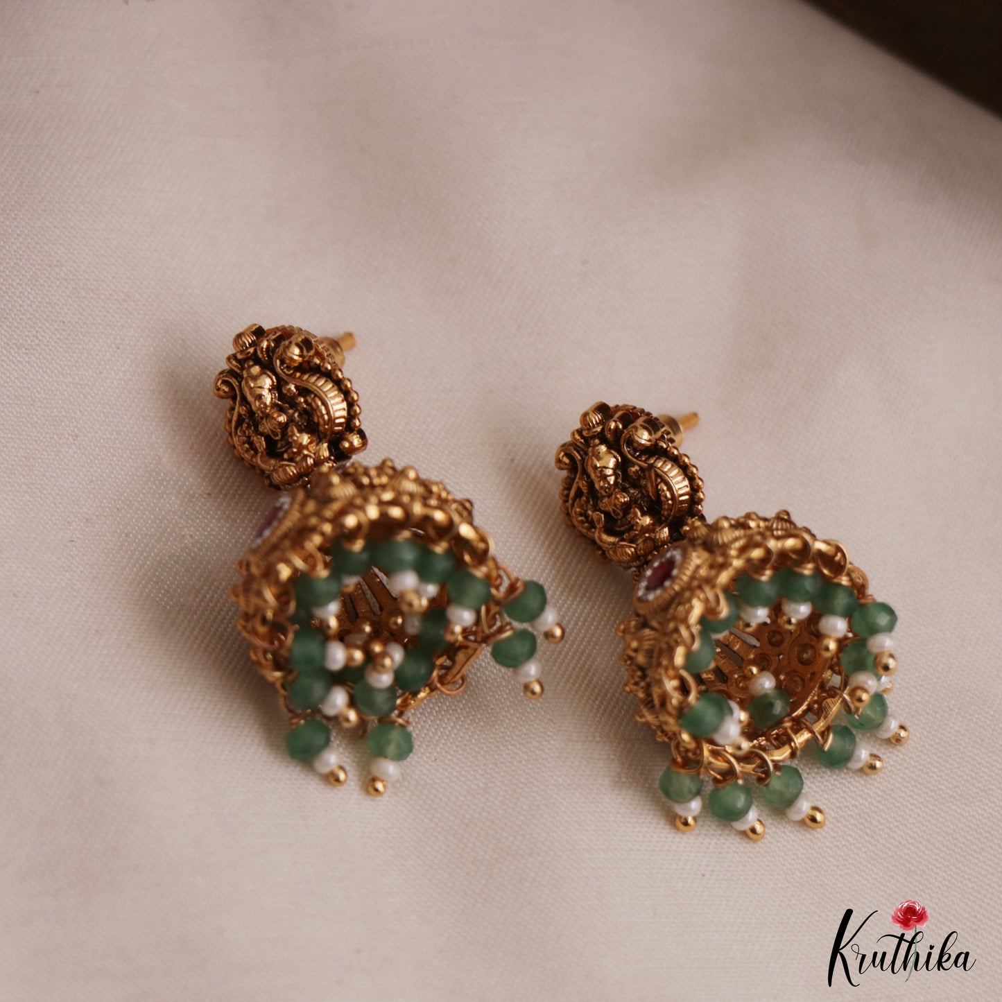 Classic Antique Lakshmi Motifs Temple Jhumkas With Green Bead Drops E1157