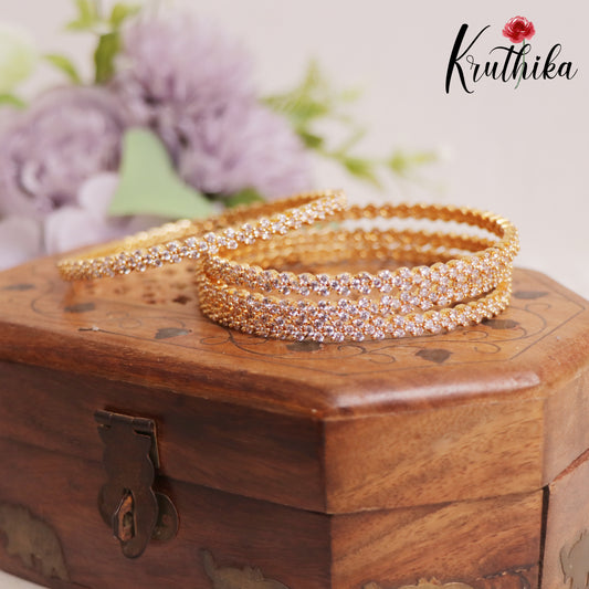 Sparkling Floral Panchaloham Daily Wear Bangles With AD Stones B381 (Set of 4)