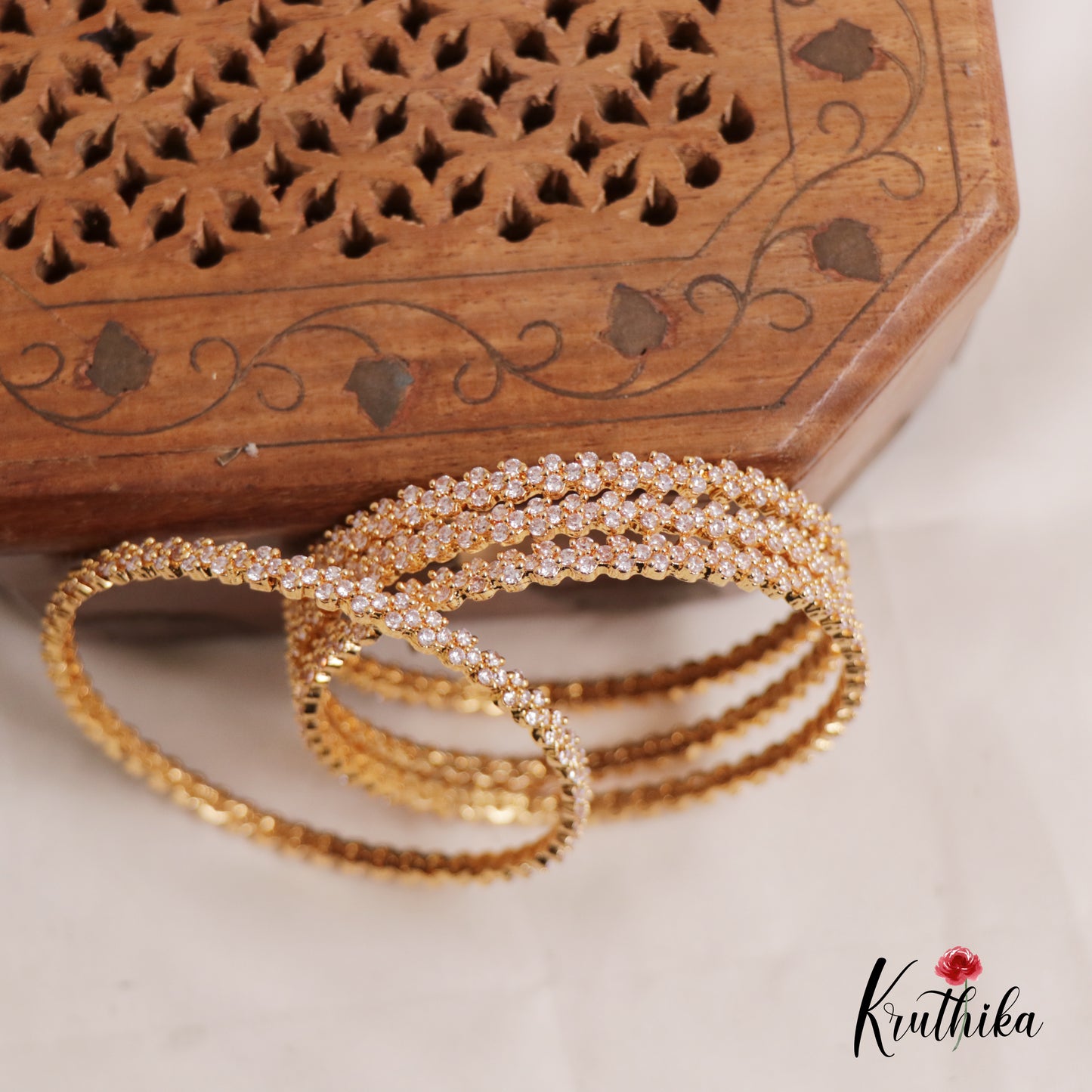 Sparkling Floral Panchaloham Daily Wear Bangles With AD Stones B381 (Set of 4)