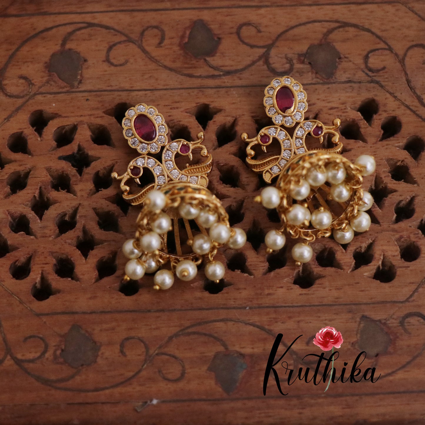 Trendy AD Peacock Jhumkas E718