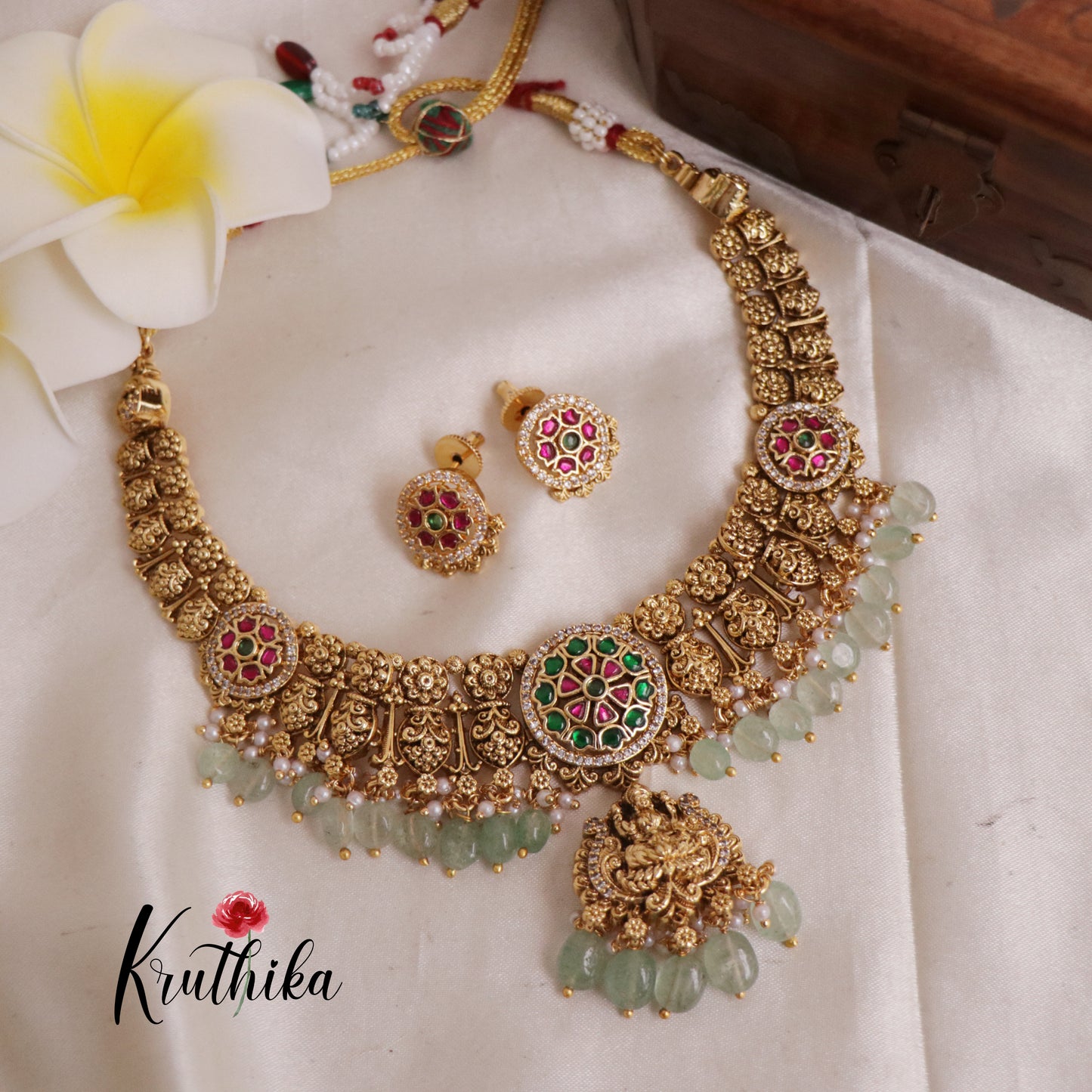 Beautiful Floral Jadau Lakshmi Necklace with Pastel Green Beads NC1916