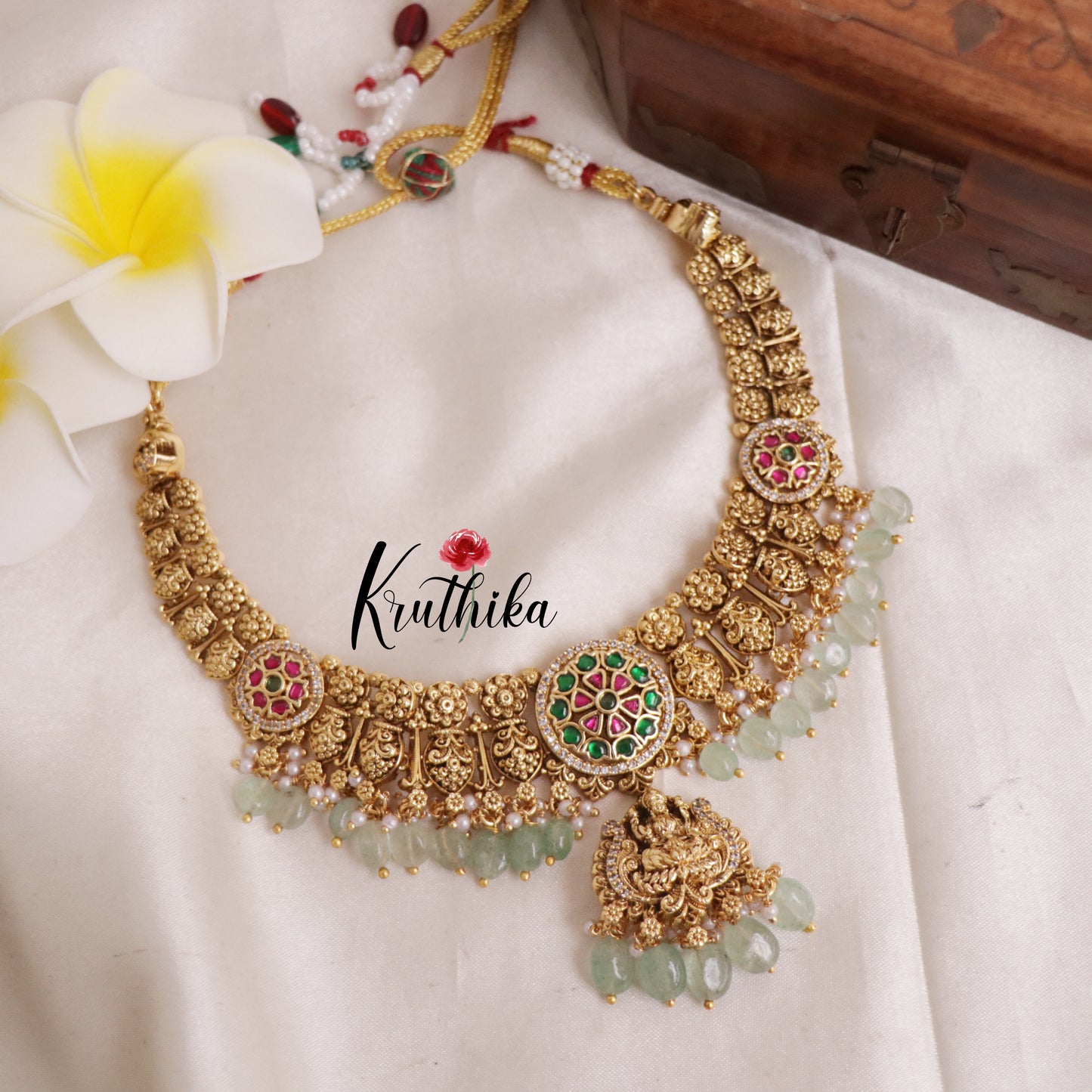Beautiful Floral Jadau Lakshmi Necklace with Pastel Green Beads NC1916