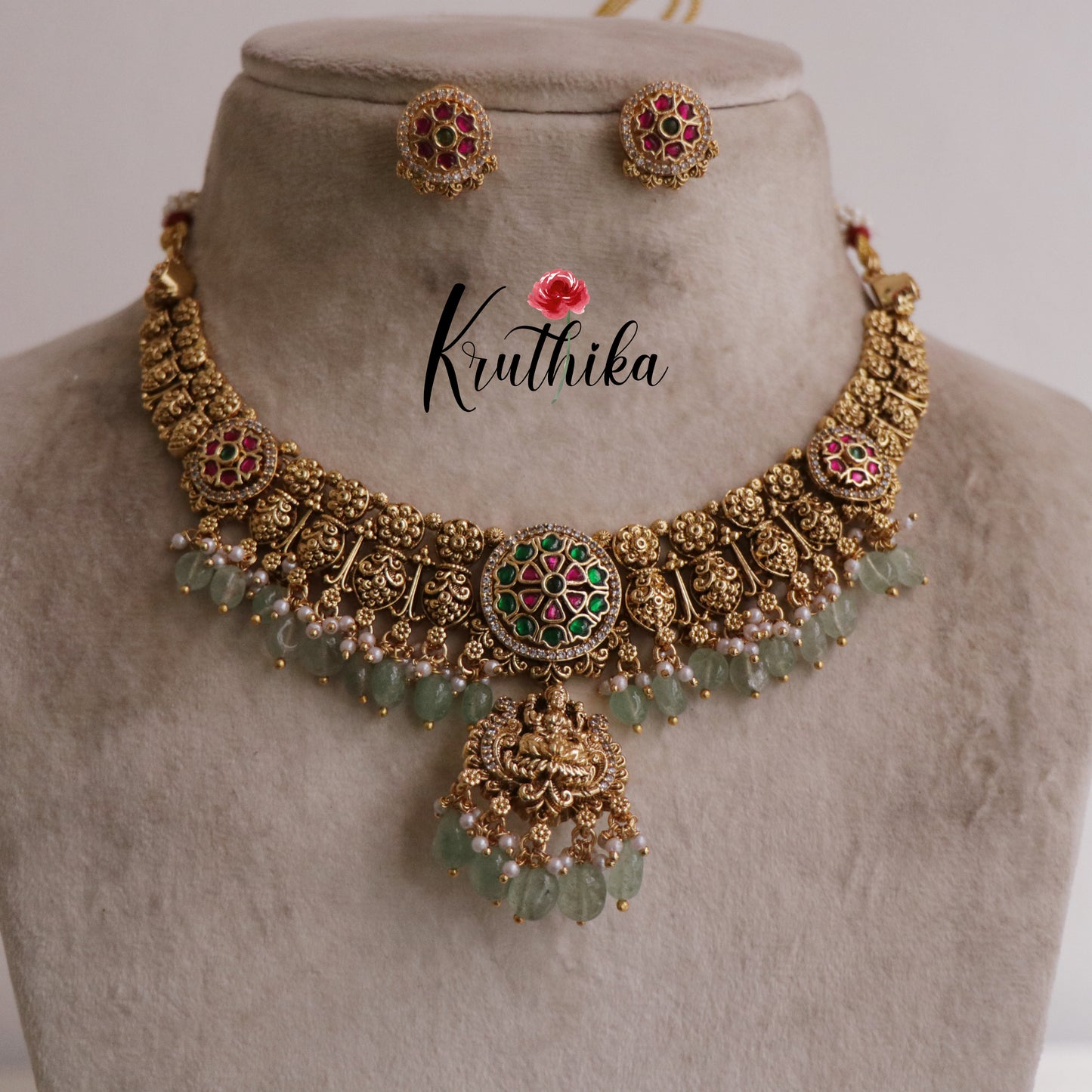 Beautiful Floral Jadau Lakshmi Necklace with Pastel Green Beads NC1916