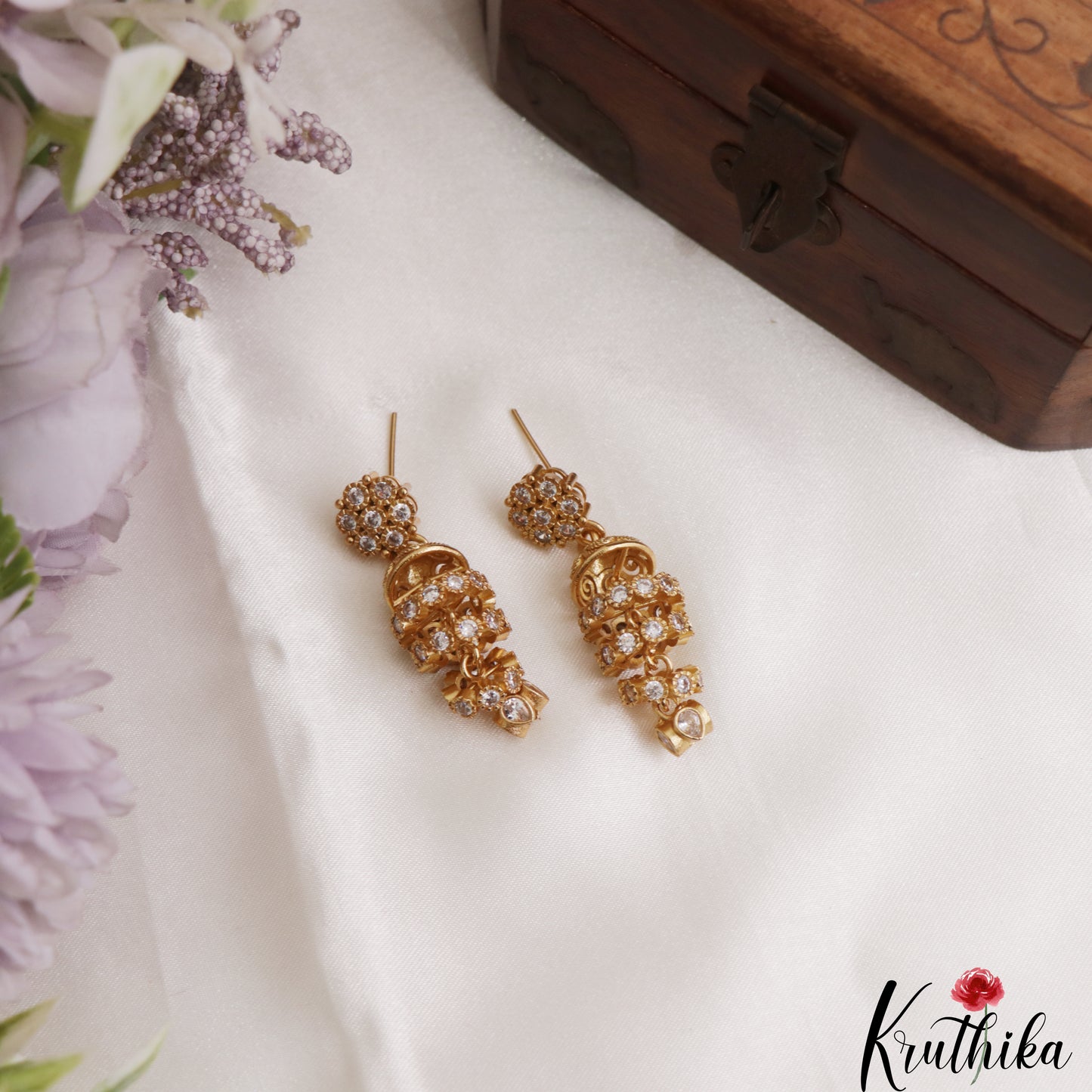 Pretty Antique Floral Motifs CZ Jhumkas E1183