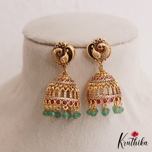 Trendy Antique Peacock Motifs Jadau Jhumkas With Green Bead Drops E1162 (Available In 2 Colors)