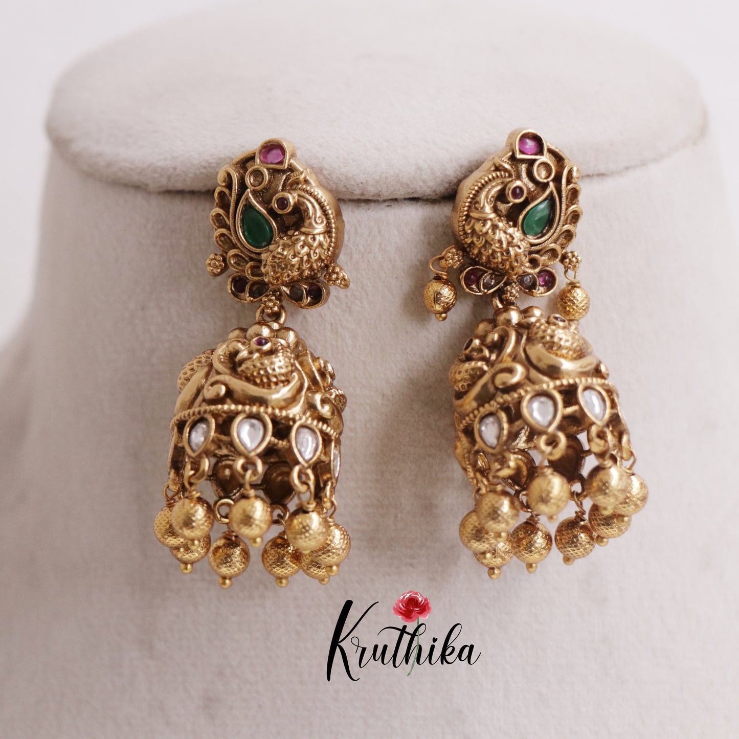 Beautiful Peacock Kundan Jhumkas with Golden Beads Drops E737