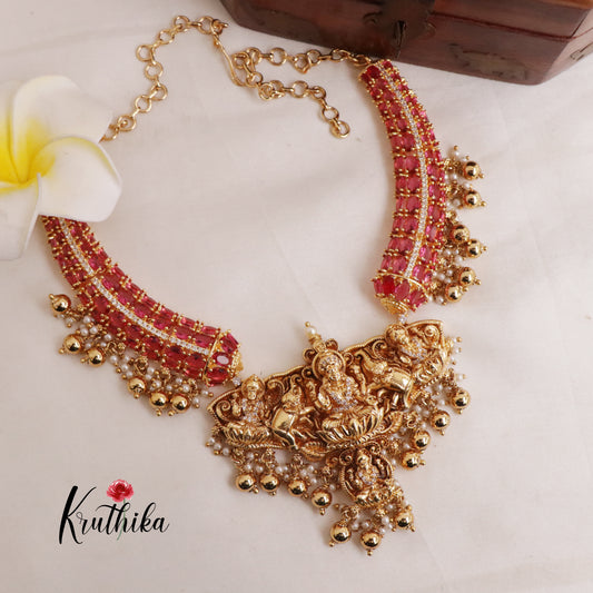 Beautiful Oval Stones CZ Lakshmi Devi Pendant Necklace with Golden Beads Drops (Availabe in 2 Colours) NC1998