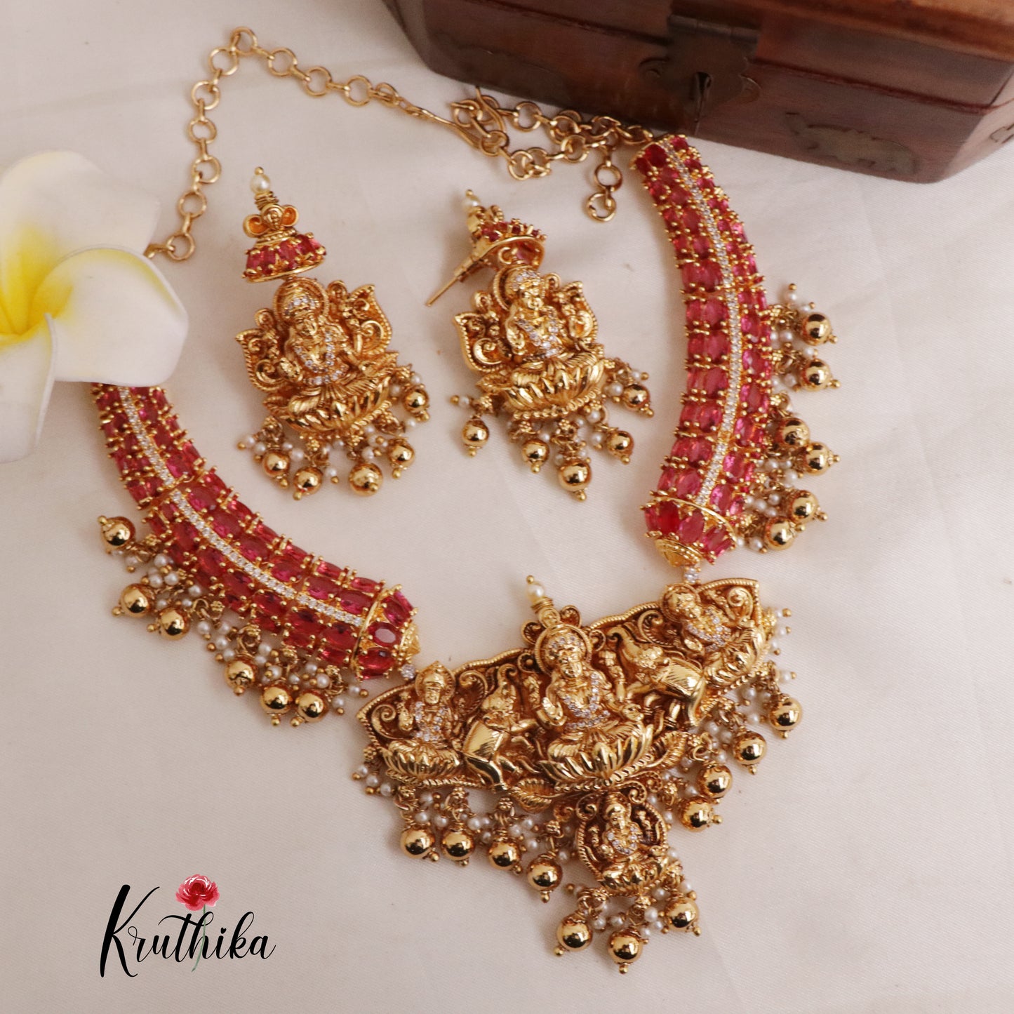 Beautiful Oval Stones CZ Lakshmi Devi Pendant Necklace with Golden Beads Drops (Availabe in 2 Colours) NC1998