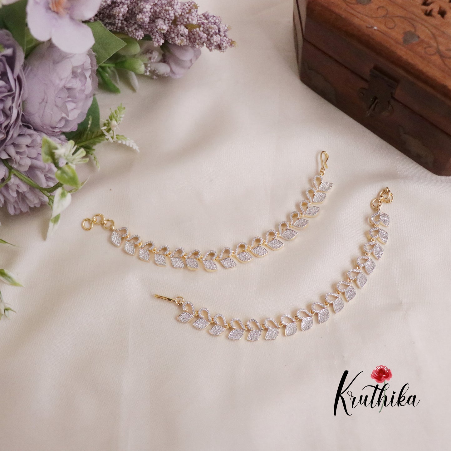 Trendy CZ Diamond Leaf Drape Earchains EC103