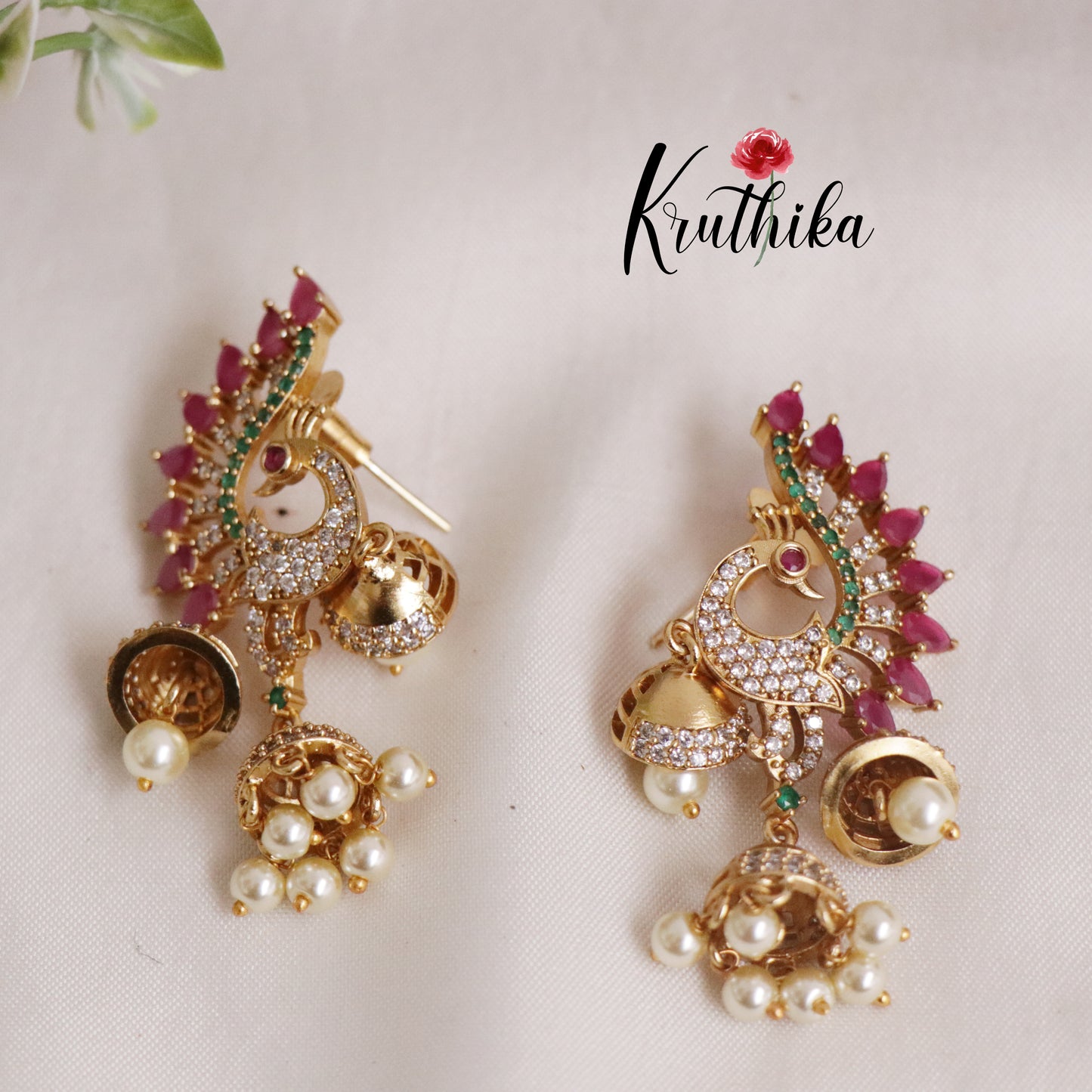 Beautiful AD Peacock Triple Jhumkas E518