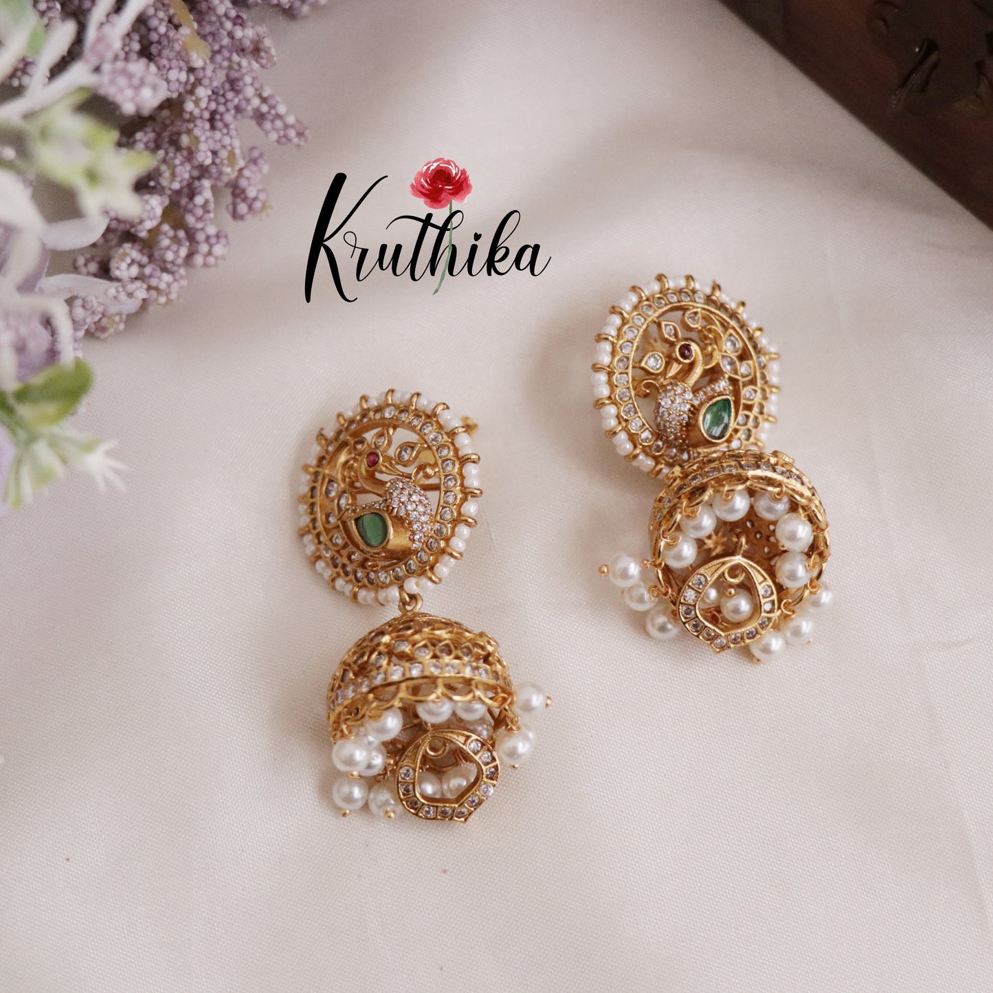 Beautiful Emerald Peacock Pearl Glow Jhumkas E606