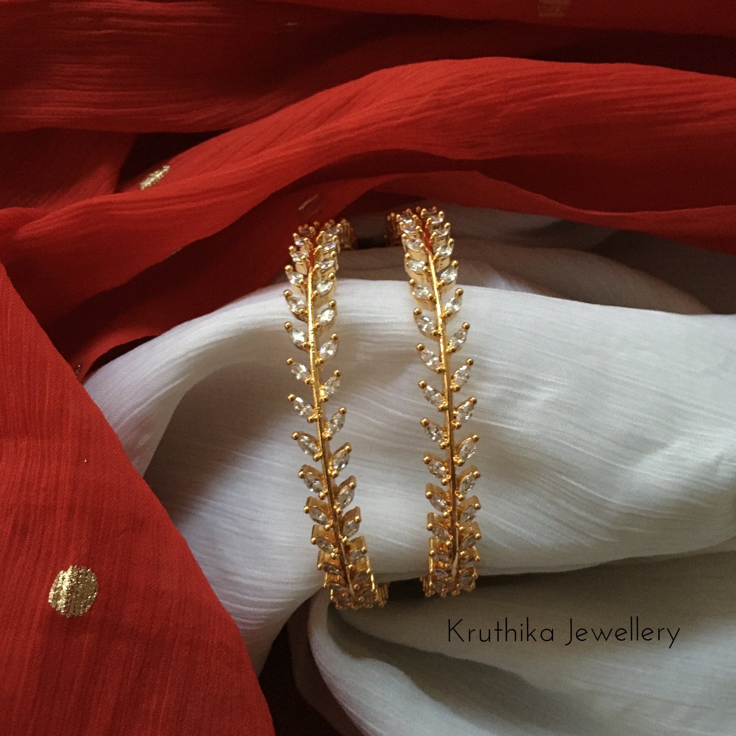 Gold finish CZ Bangles B21