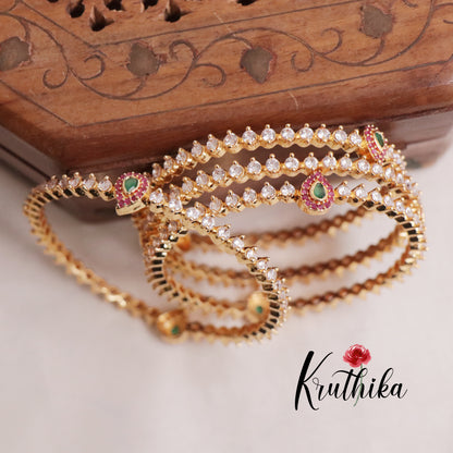 Trendy Gold Finish Multi Stone Bangles B205 (set of 4)