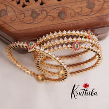 Trendy Gold Finish Multi Stone Bangles B205