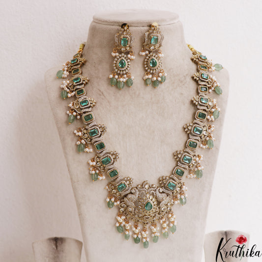 Stunning Geometric Motifs AD Victorian Haaram With Mint Green Bead Drops LH2102