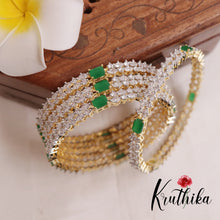 Sparkling CZ Gold Finish Green Bangles (set of four) B183