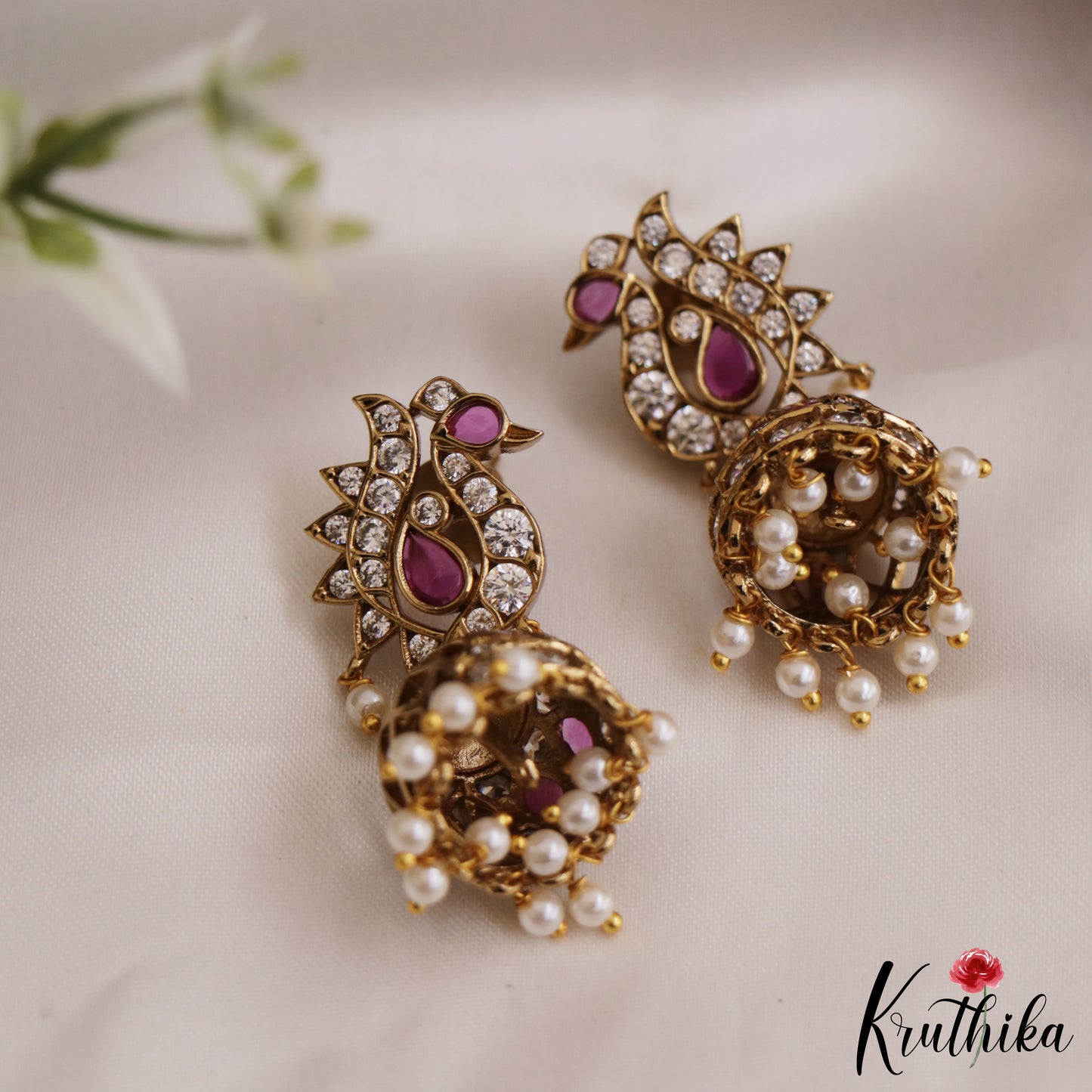 Elegant Peacock AD Jhumka Earrings With Pearl Drops E878 (Available In 3 Colors)