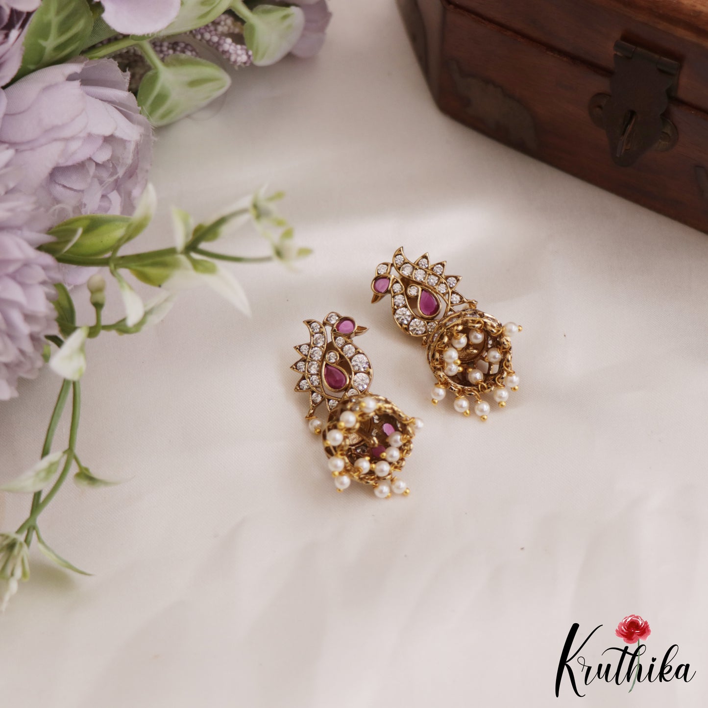 Elegant Peacock AD Jhumka Earrings With Pearl Drops E878 (Available In 3 Colors)