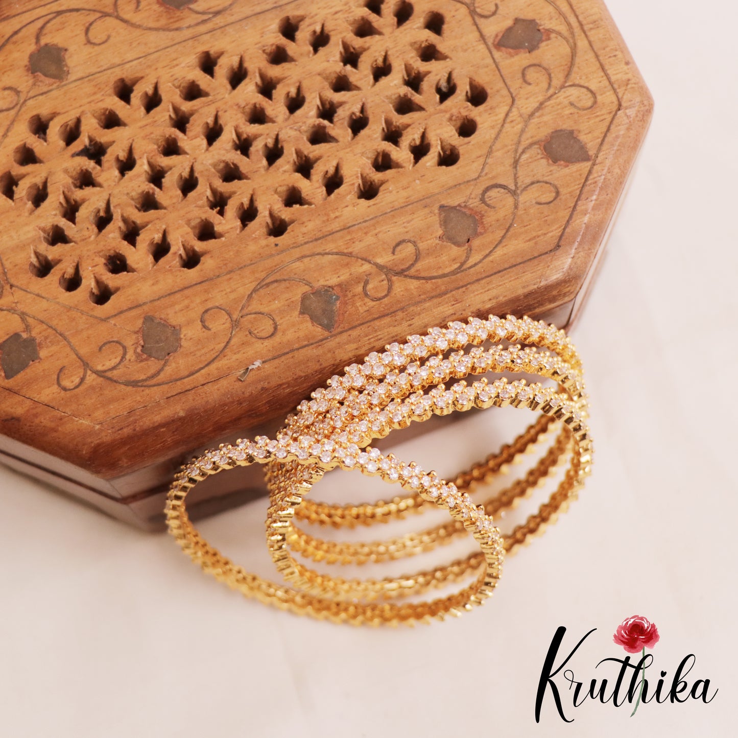 Sparkling Floral Motifs Gold-Tone AD Bangles B504 (Set of 4 Bangles)