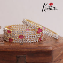 Sparkling CZ gold finish Ruby Bangles B182
