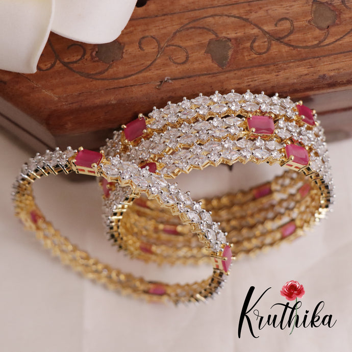 Sparkling CZ gold finish Ruby Bangles B182