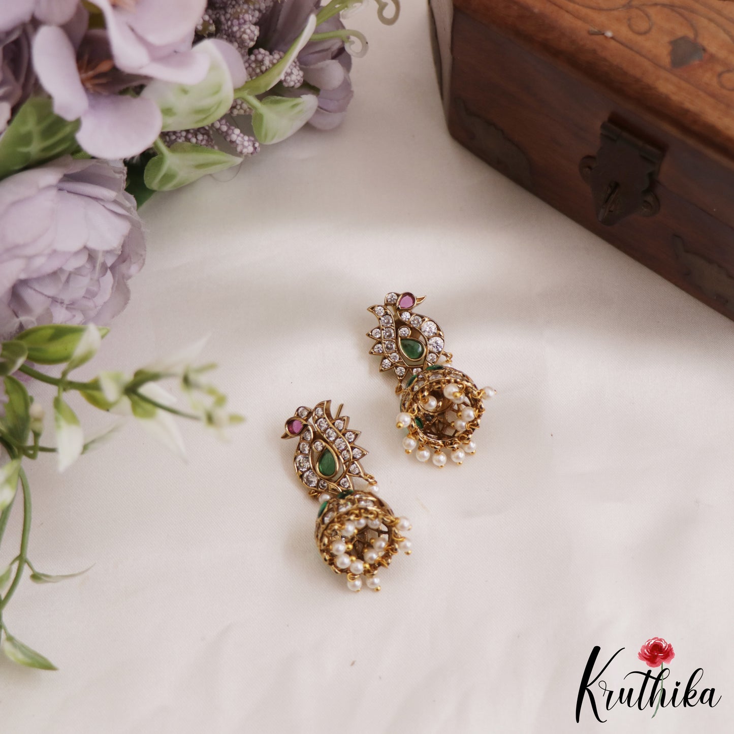 Elegant Peacock AD Jhumka Earrings With Pearl Drops E878 (Available In 3 Colors)