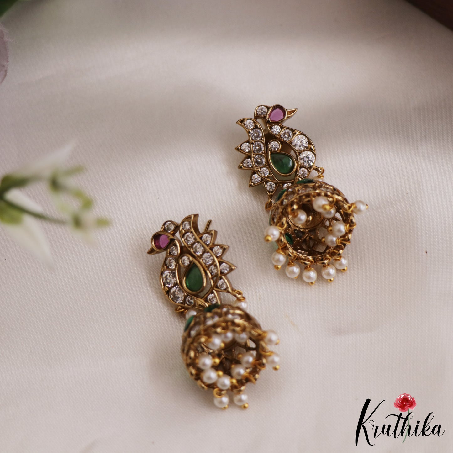 Elegant Peacock AD Jhumka Earrings With Pearl Drops E878 (Available In 3 Colors)