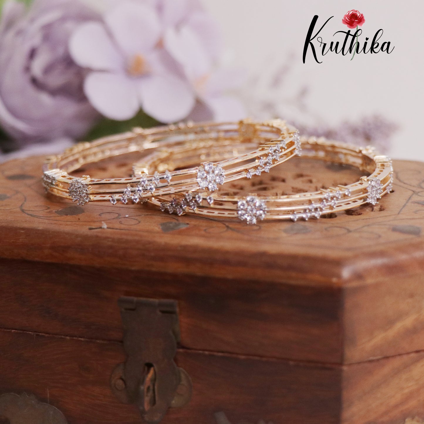 Elegant Diamond-Finish Gold-Tone Bangles (Set of 2) B319