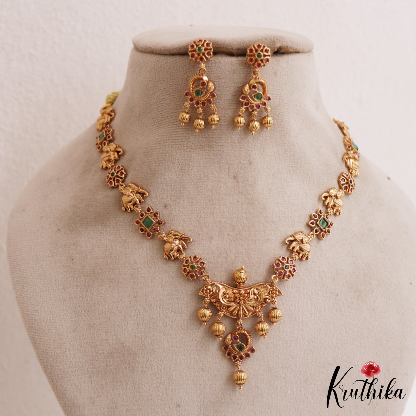 Simple Antique Floral Elephant Motifs With Golden Bead Drops NC2782