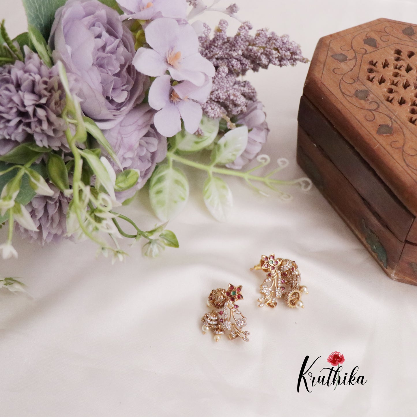 Beautiful CZ Sparking Jhumkas E657 ( Available in 2 Colours)