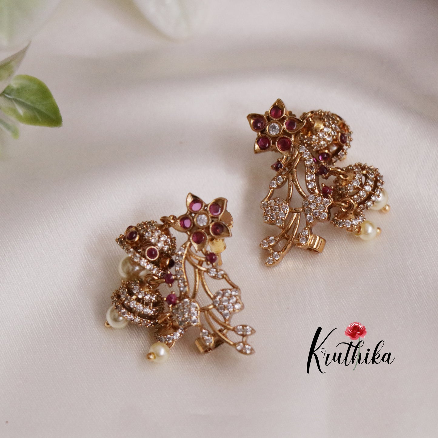 Beautiful CZ Sparking Jhumkas E657 ( Available in 2 Colours)