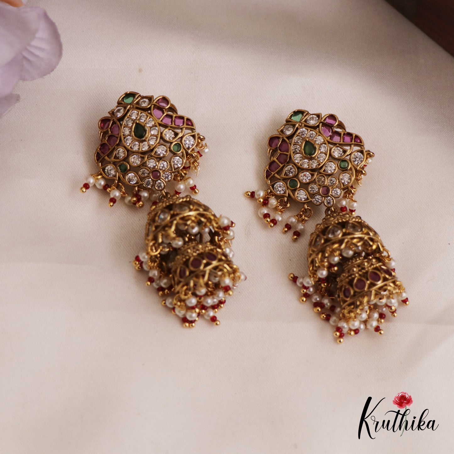 Beautiful AD Peacock Teardrop Motifs Jhumka With Bead Drops E994 (Available In 2 Colors)