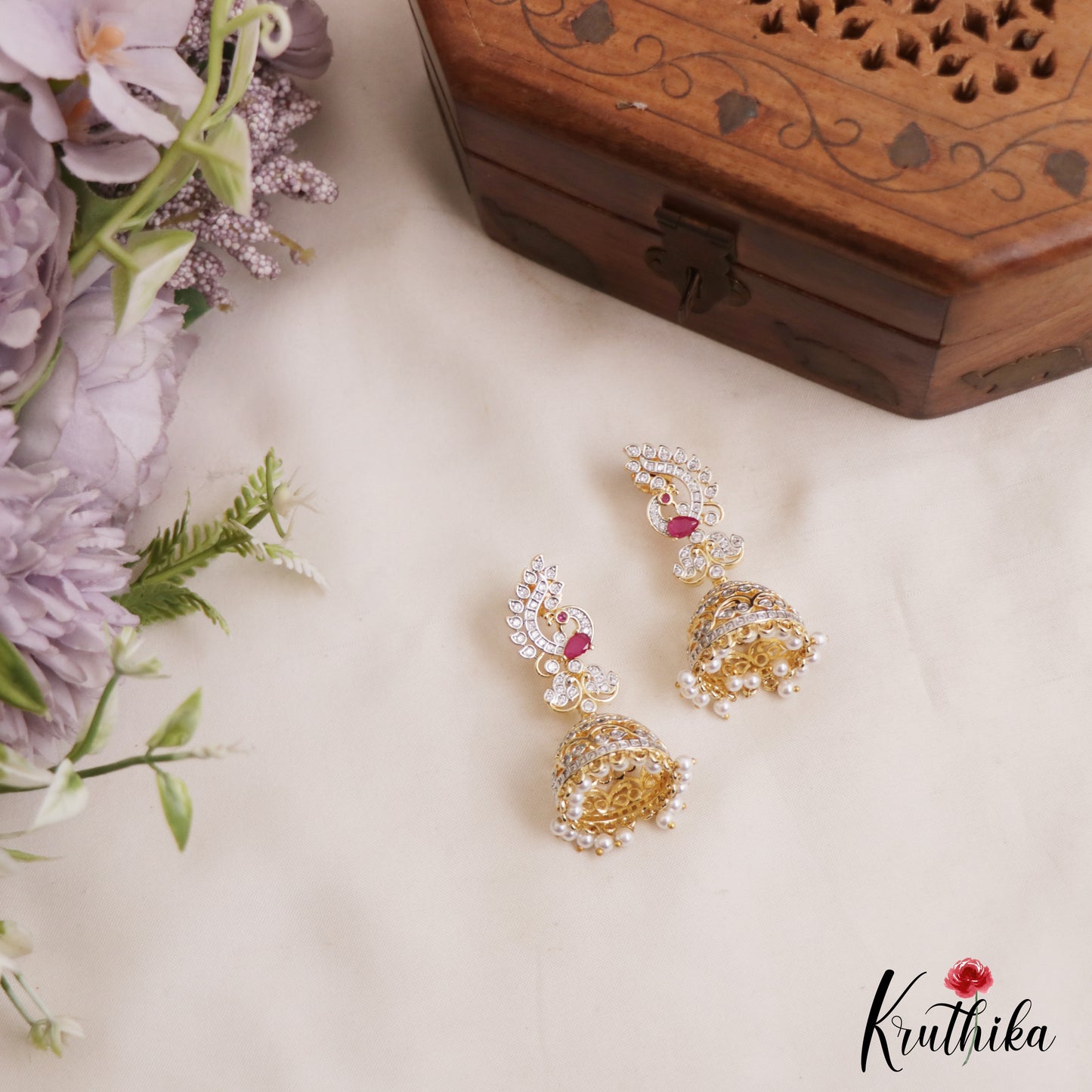 Sparkling Peacock Motifs AD Jhumkas With Pearl Drops E1095 (Available In 3 Colors)