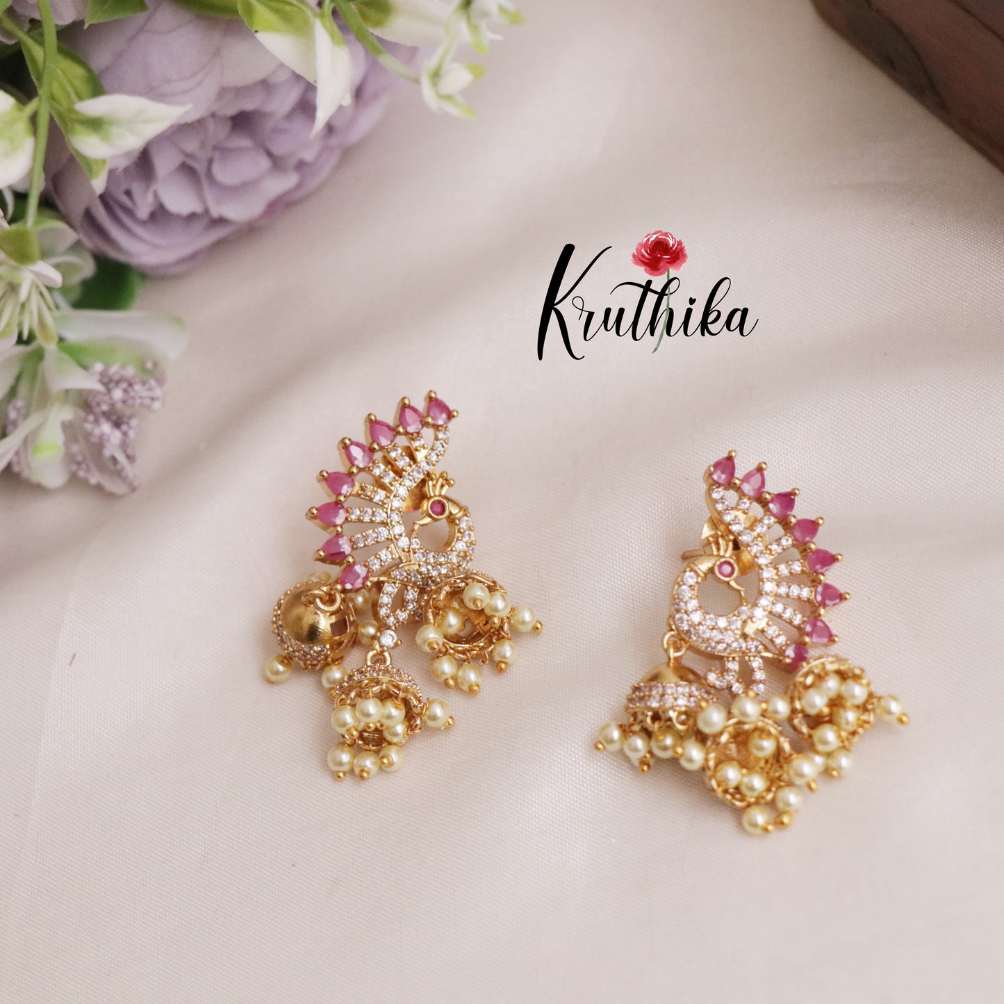 Beautiful AD Peacock Triple Jhumkas E518