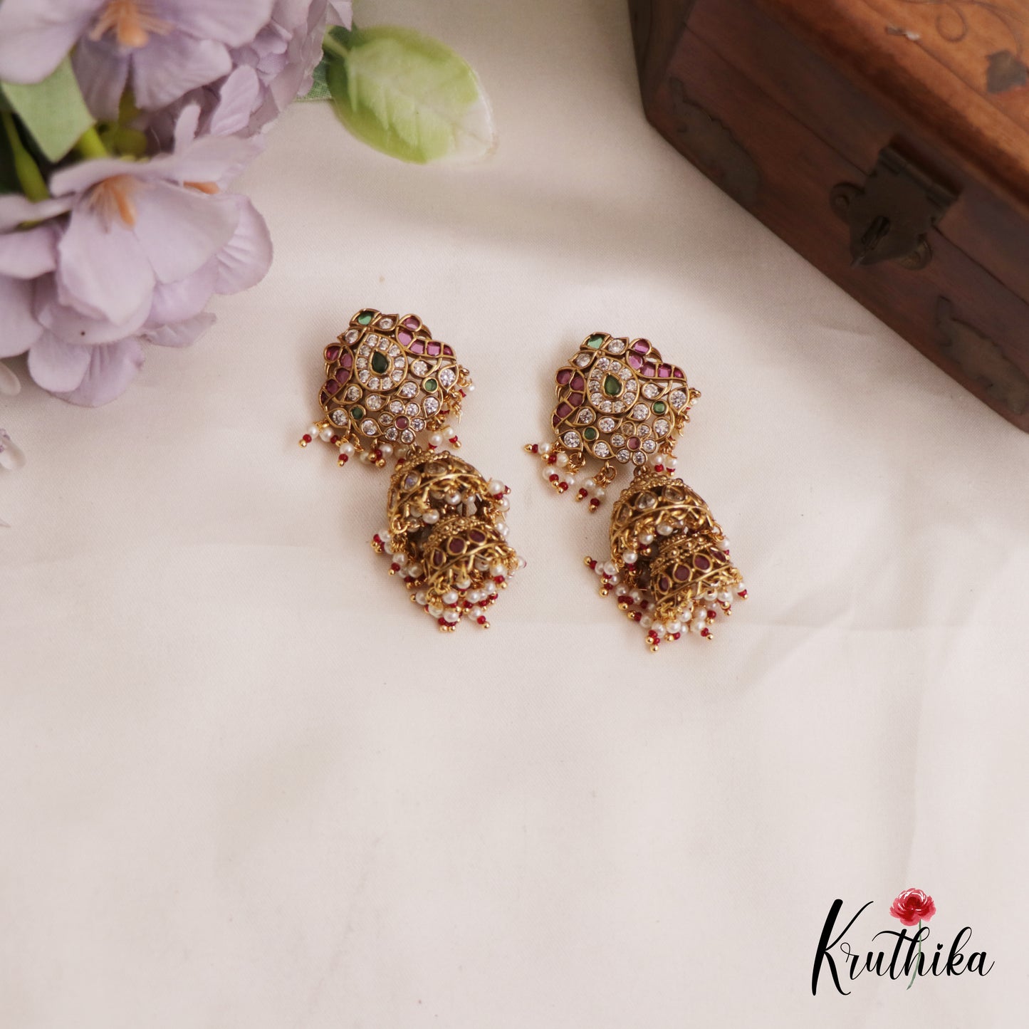 Beautiful AD Peacock Teardrop Motifs Jhumka With Bead Drops E994 (Available In 2 Colors)