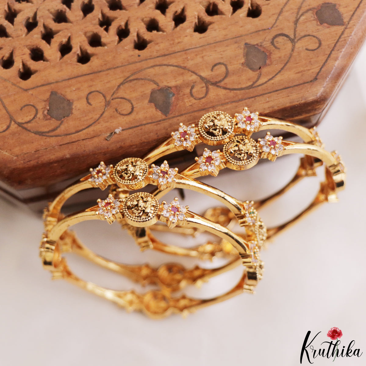 Trendy Antique Floral Lakshmi Motifs Diamond-Finish Gold-Tone CZ Bangles B580