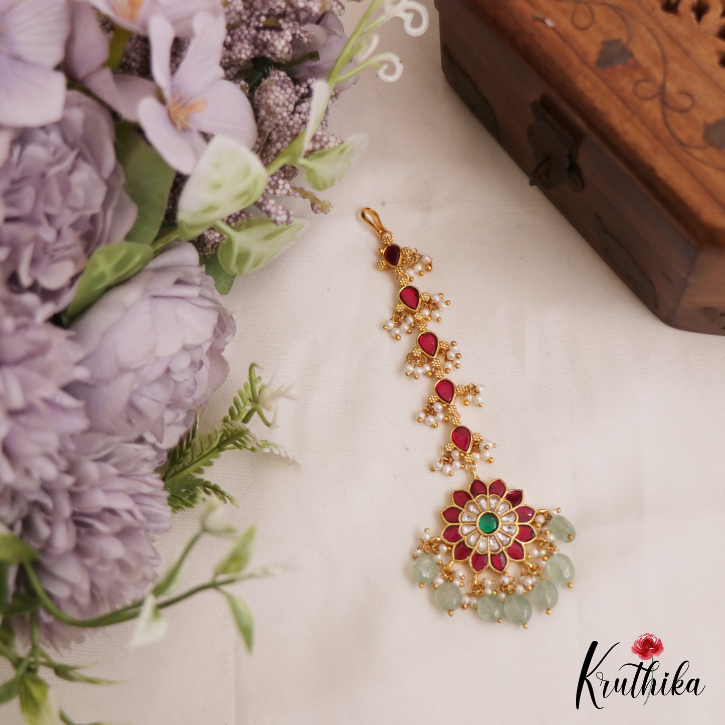 Beautiful Floral Motifs Kemp Maang Tikka With Green Bead Drops MT374